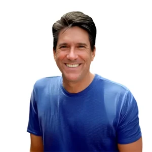 Ken Warkentin professional headshot wearing a blue athletic shirt against a light gray background.