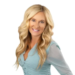 Sheri Keene - WBG - 500x500 Sheri Keene professional headshot wearing a light blue blouse, posed against a light neutral background.