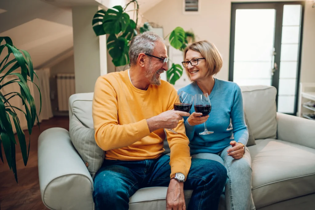 loving-couple-cheers-wine-on-cozy-sofa-2026-01-09-09-12-58-utc (1)