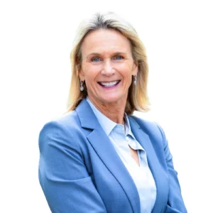 Susanne Livington - WBG - 500x500 Susanne Livington professional headshot wearing a light blue blazer and button-down shirt against a clean, neutral background.
